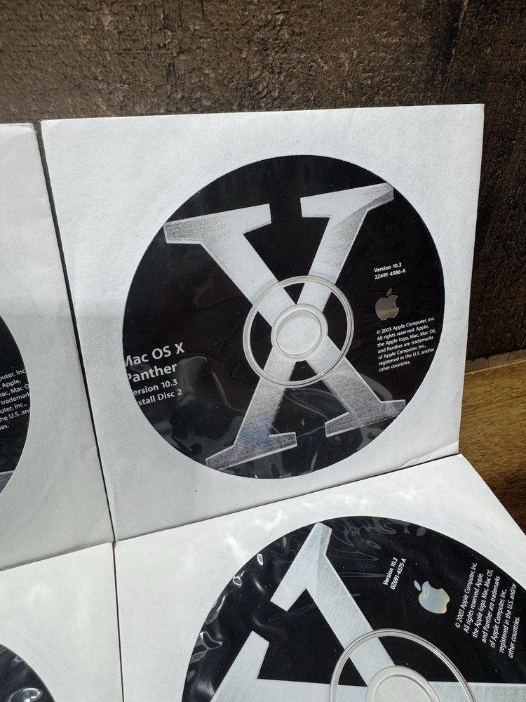 Apple Mac OS X Panther Version 10.3 Disc Set & Mac OS X Xcode Tools Version 1.0.