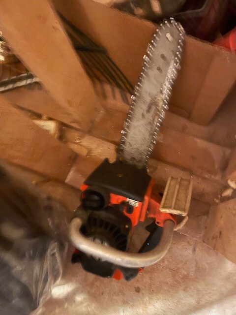 landscaping equipment-weed whacker and chain saw