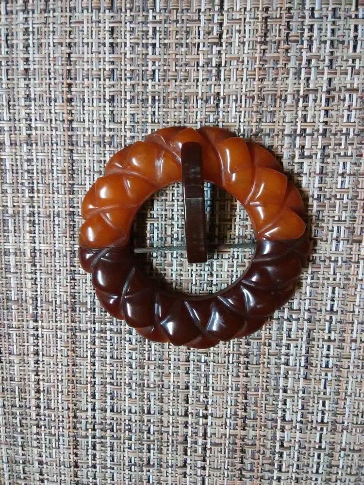 Carved Bakelite buckle