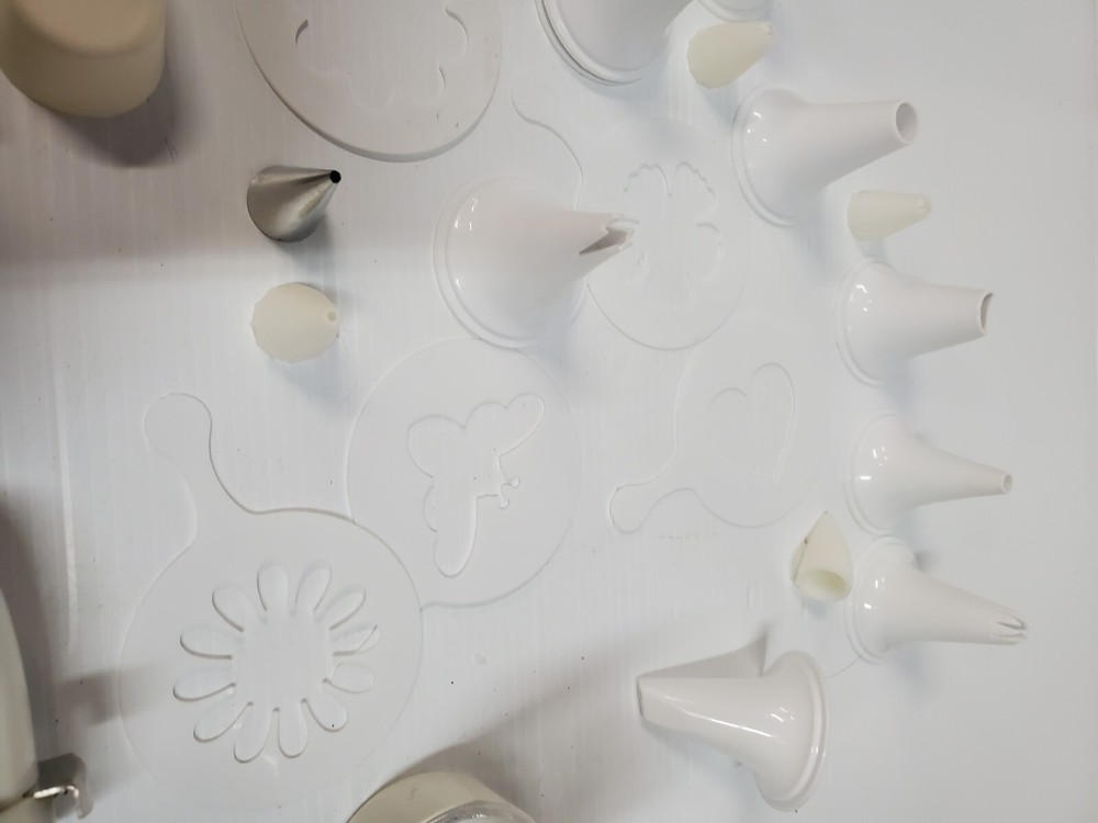 White plastic Cookie Press Disc Cutouts -with extras