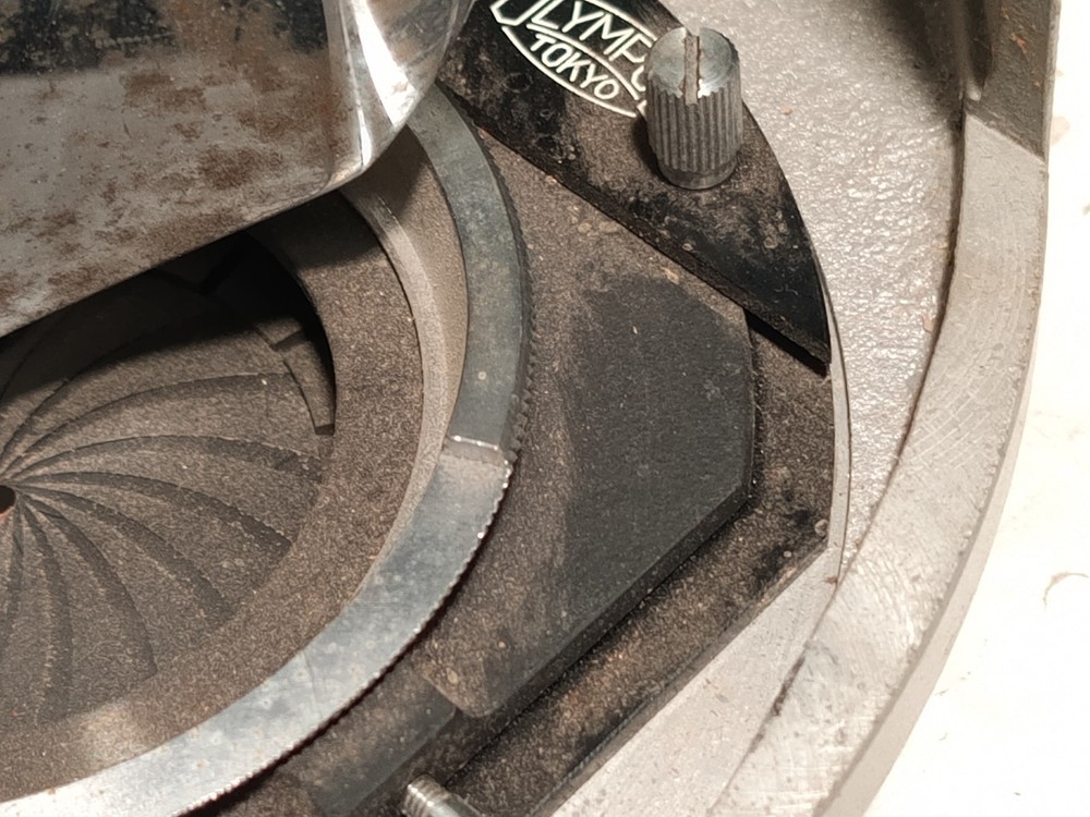 Olympus Tokyo microscope base w/ iris diaphragm, rotating stage, mirror shown