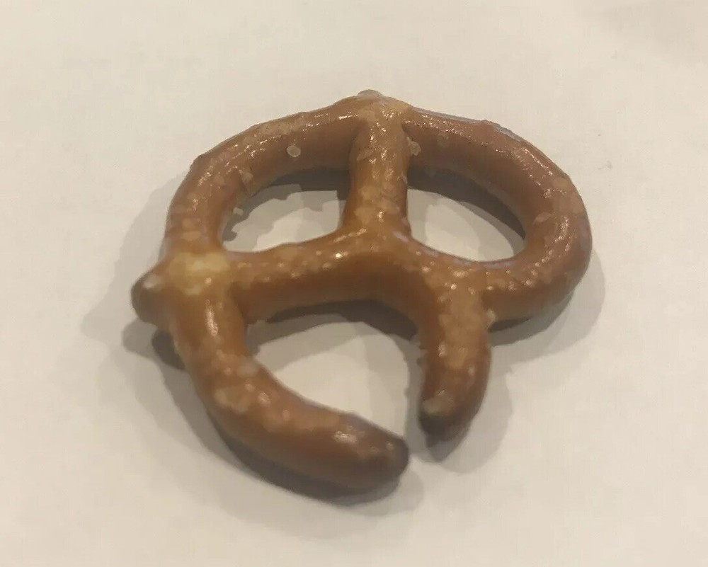 ERROR PRETZEL OPENING WAS LIKELY BURNED WHEN ORIGINALLY MADE