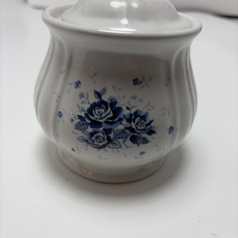 White Ceramic With Blue Roses Image