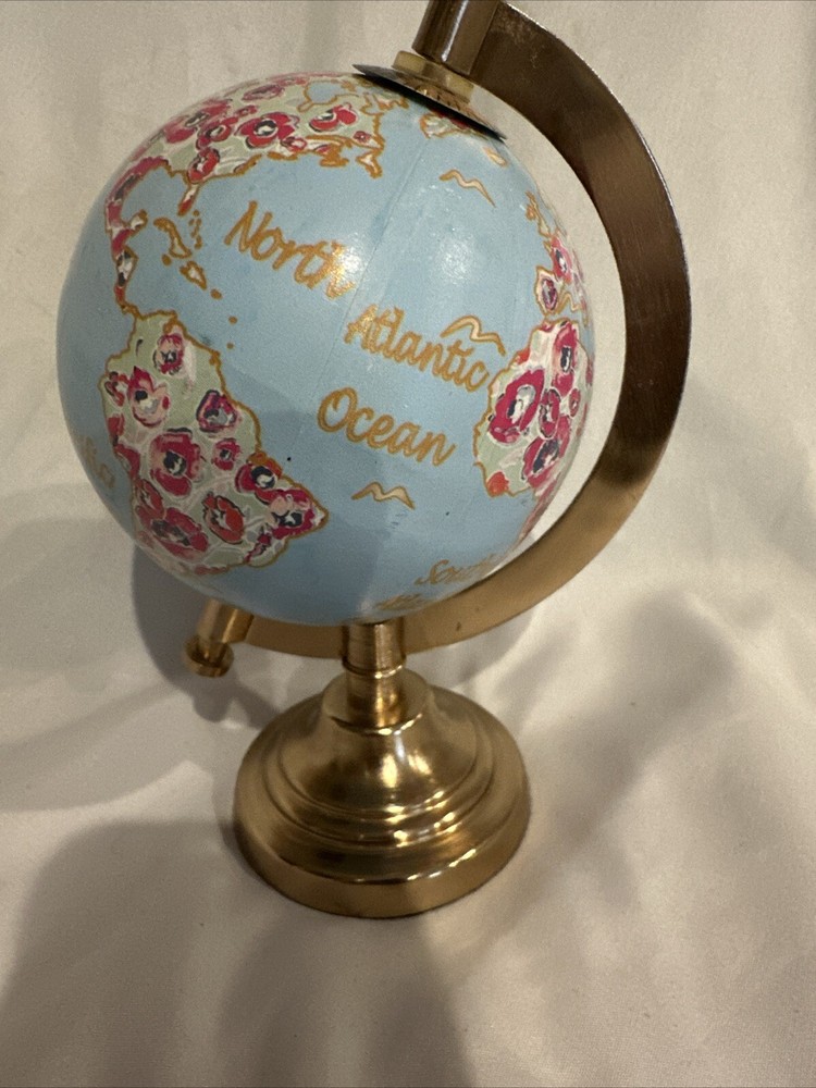 World Globe With Flowers By Threshold?