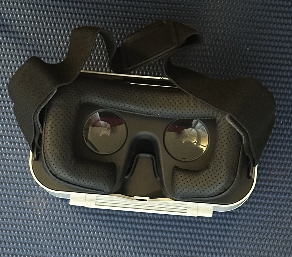 Sharper Image Smartphone 360 VR Headset with Controller and Integrated Earbuds