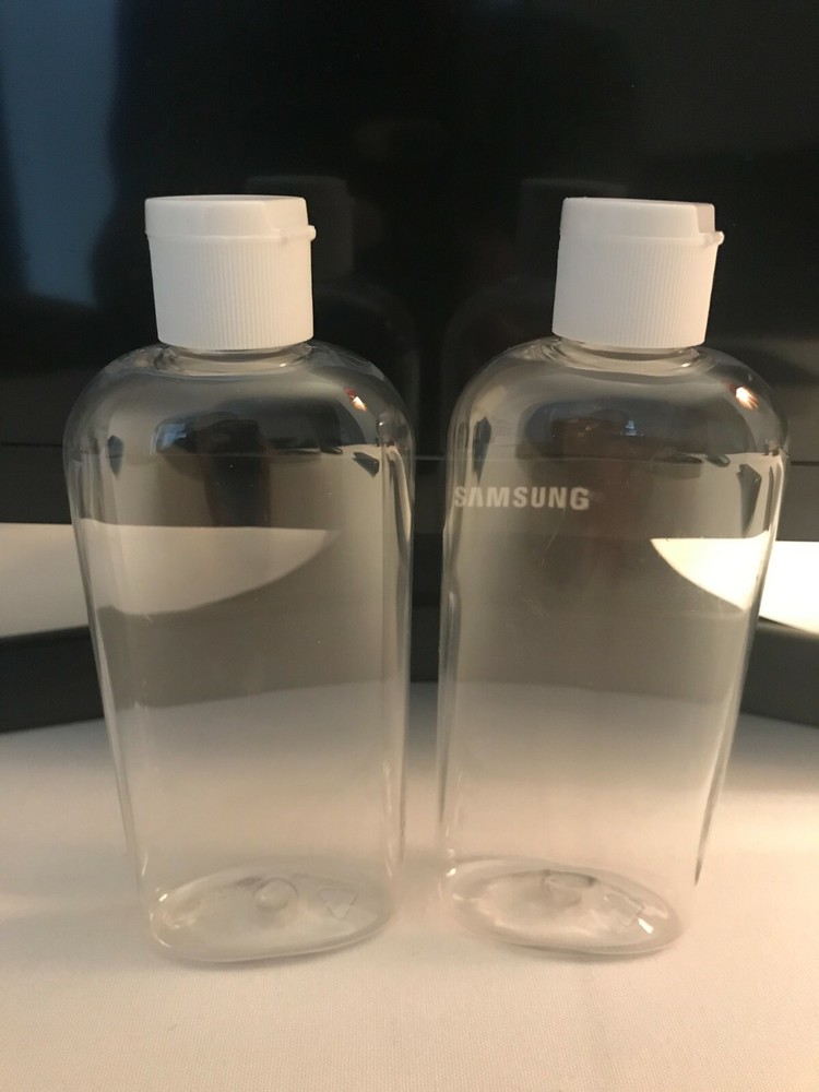 Two 4 oz Clear Plastic Oval shape bottles with Flip-top cap