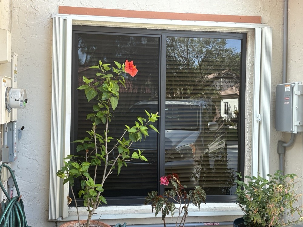 Various sized hurricane window shutter panels