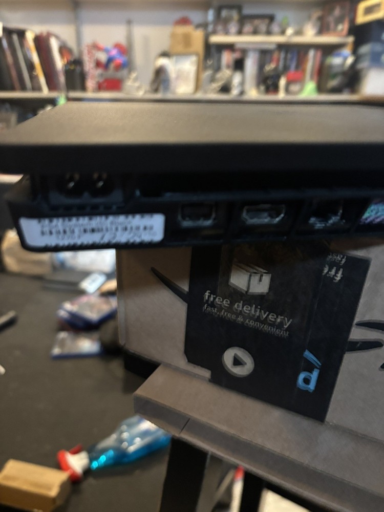 Playstation 4 Console with controller and seven games