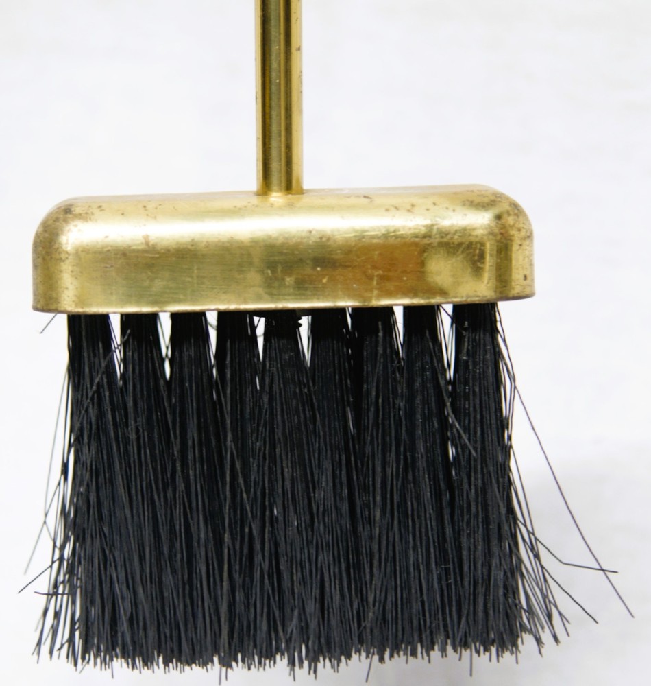 Four-piece brass fireplace poker set