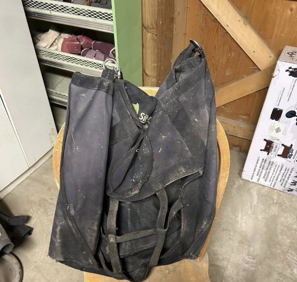 Black hat bag and a cattle grooming come