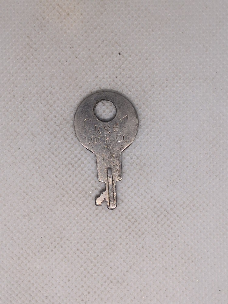 Crest Lock Luggage Key.  No Stamping