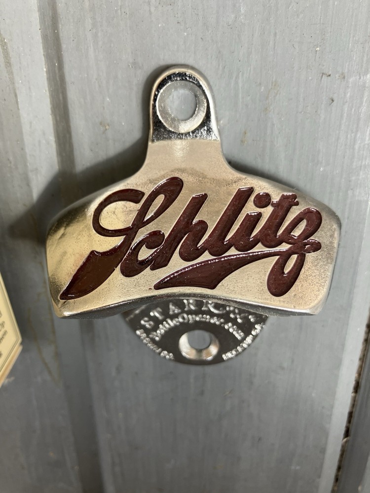 SCHLITZ STARR X WALL MOUNT BOTTLE OPENER.