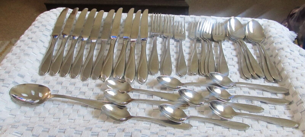 43 PC Oneida Camber Cresta Windswept Scroll Glossy Stainless Flatware