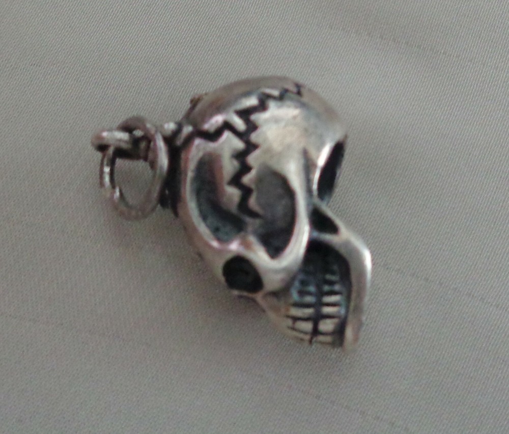 STERLING SILVER SKULL PENDANT  1" LONG