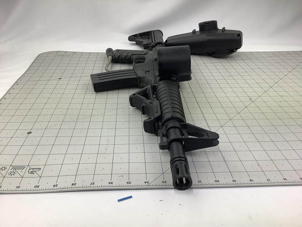 Tippmann Alpha black paintball marker with e trigger and cyclone feed untested