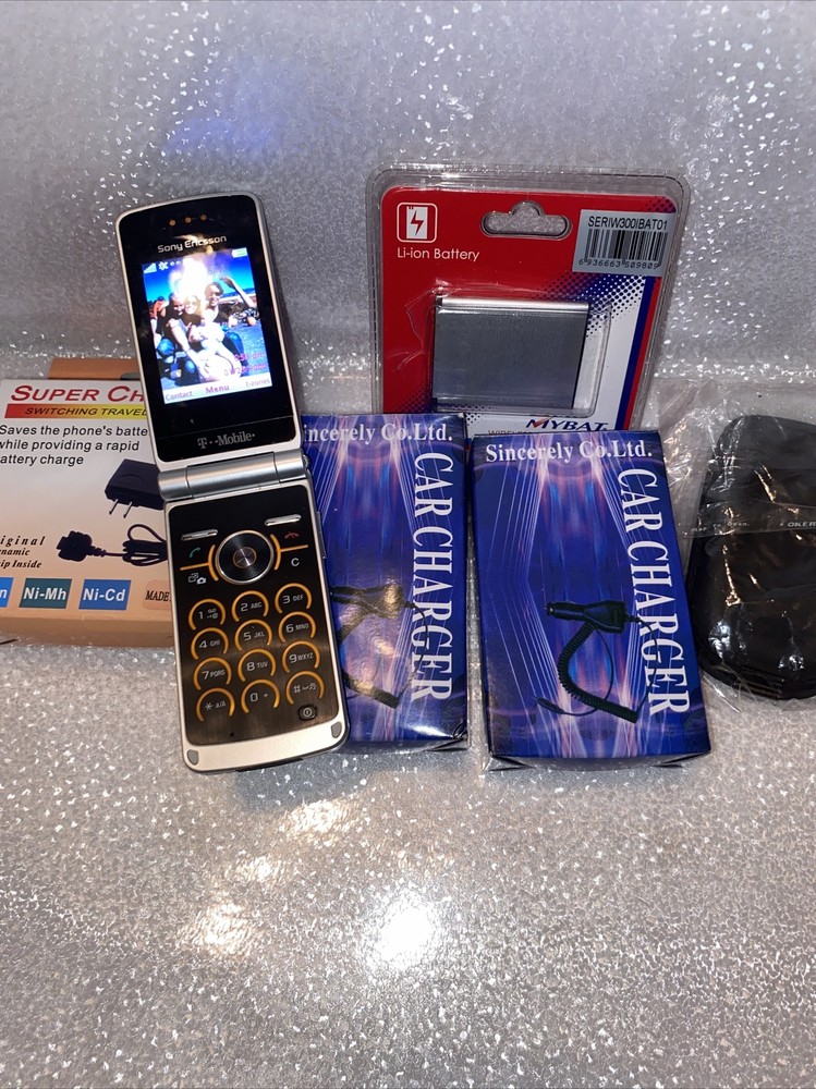 used cell Flip phone bundle Sony Ericsson T Mobile chargers case extra battery