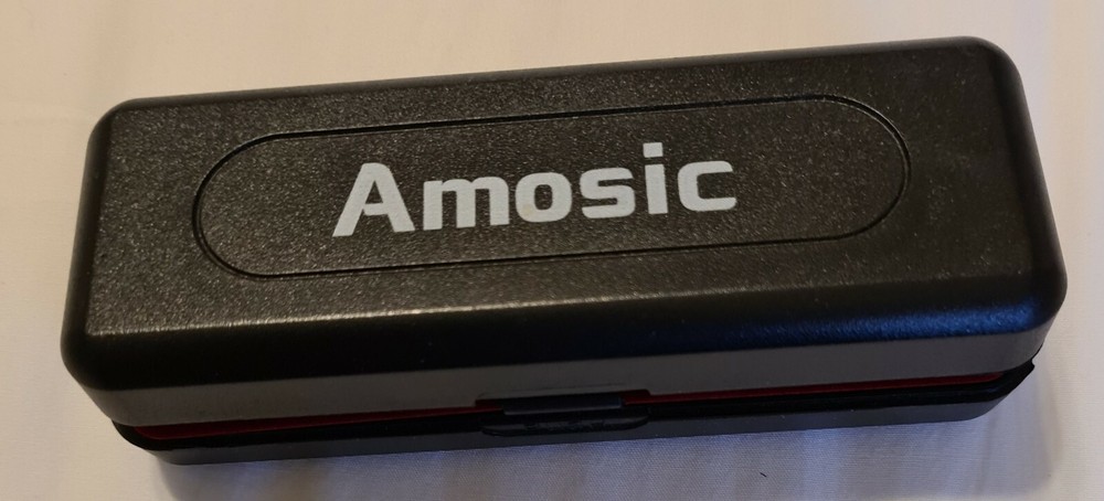 Amosic Harmonica new with box