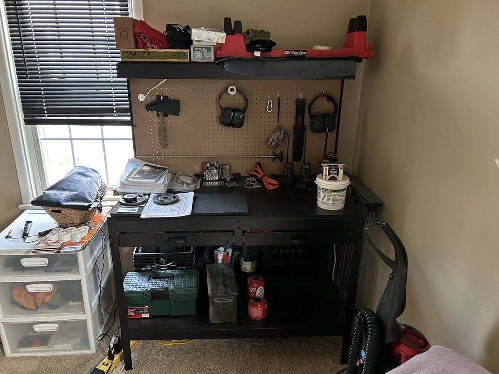 Work Bench With Pegboard Back And Overhead Light.