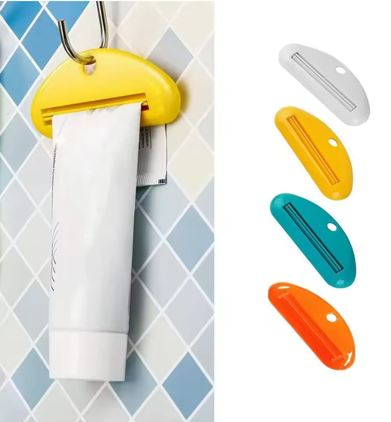 4X Plastic Tube Squeezer Toothpaste Dispenser Holder Rolling Bathroom Extract