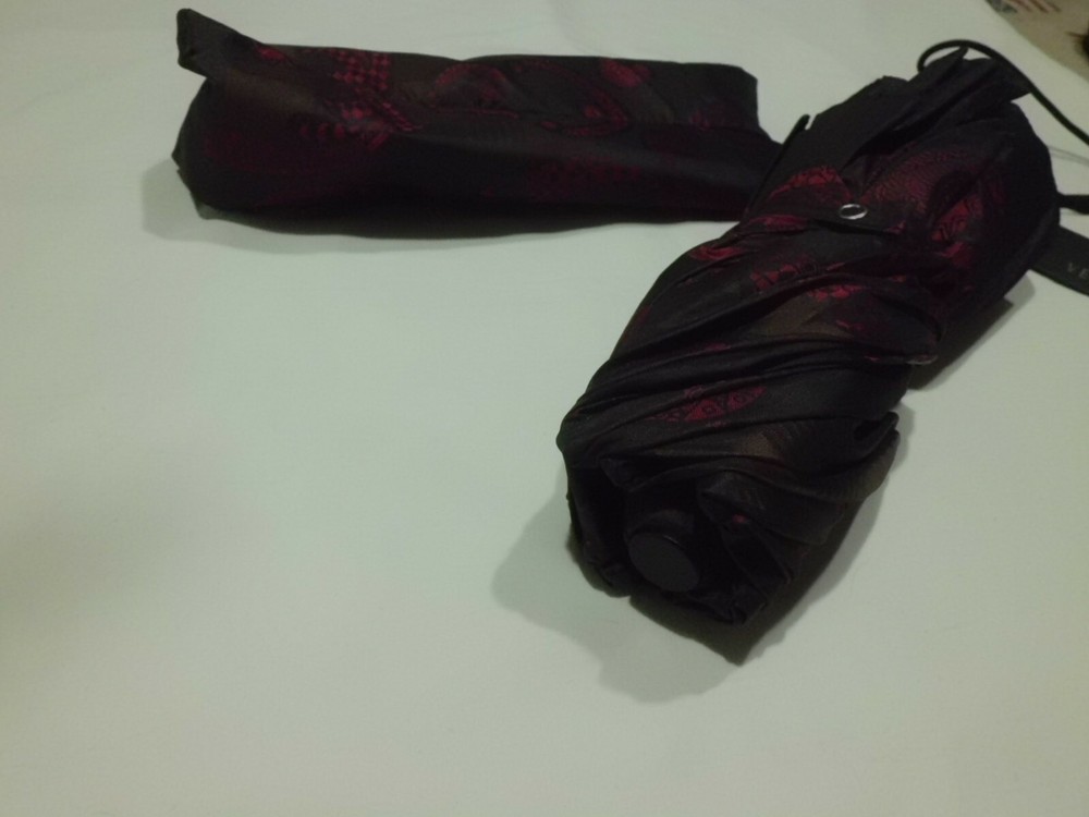 Versace Umbrella Man New