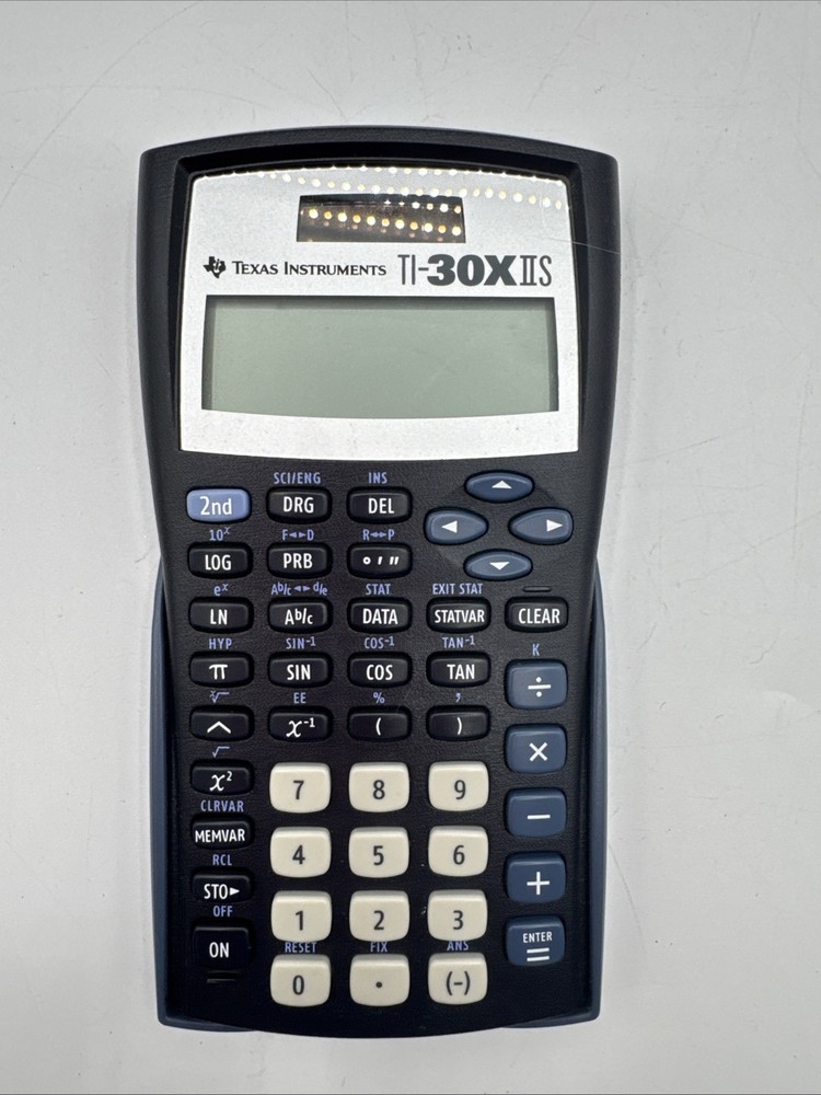 Texas instruments T1-30X 11S calculator with case.