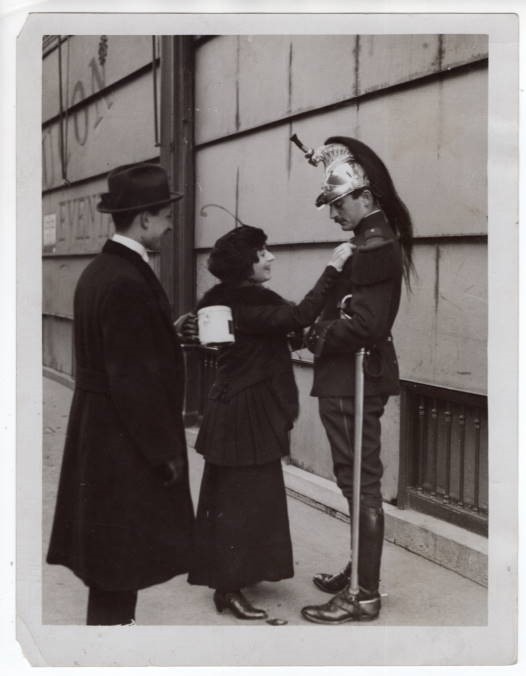 WWI Belgian Flag Day in Paris Woman Decorates Cavalrymen With Flag News Photo
