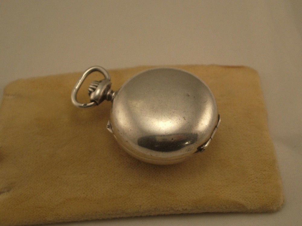 ANTIQUE SILVER COIN HOLDER