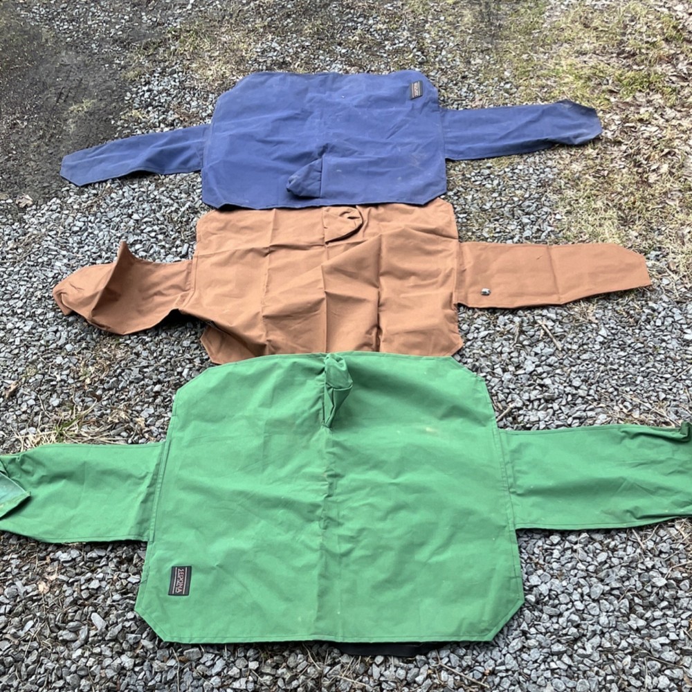 3 saddle covers.  One new 2 used