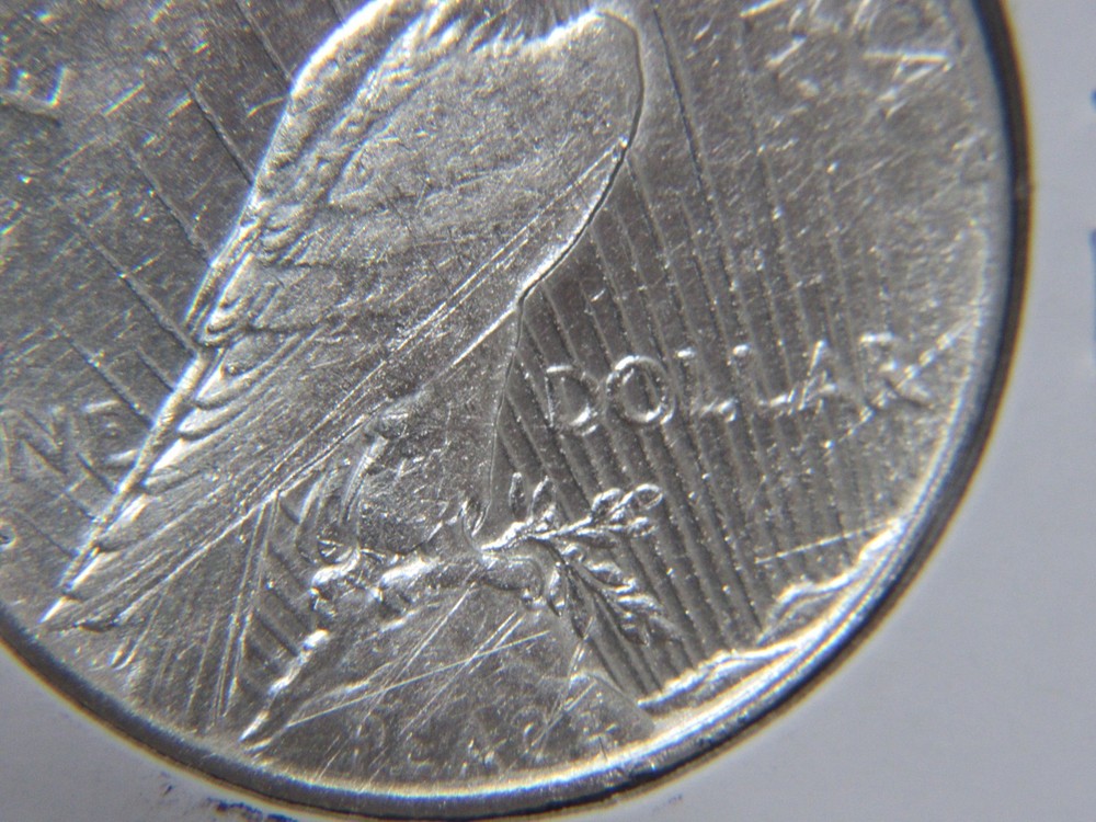 1934-S Peace dollar A.U. with light scratches on reverse