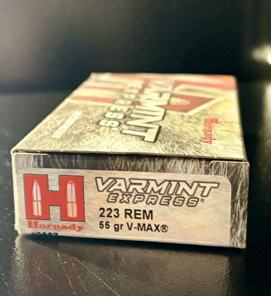 Various empty cardboard ammo boxes.