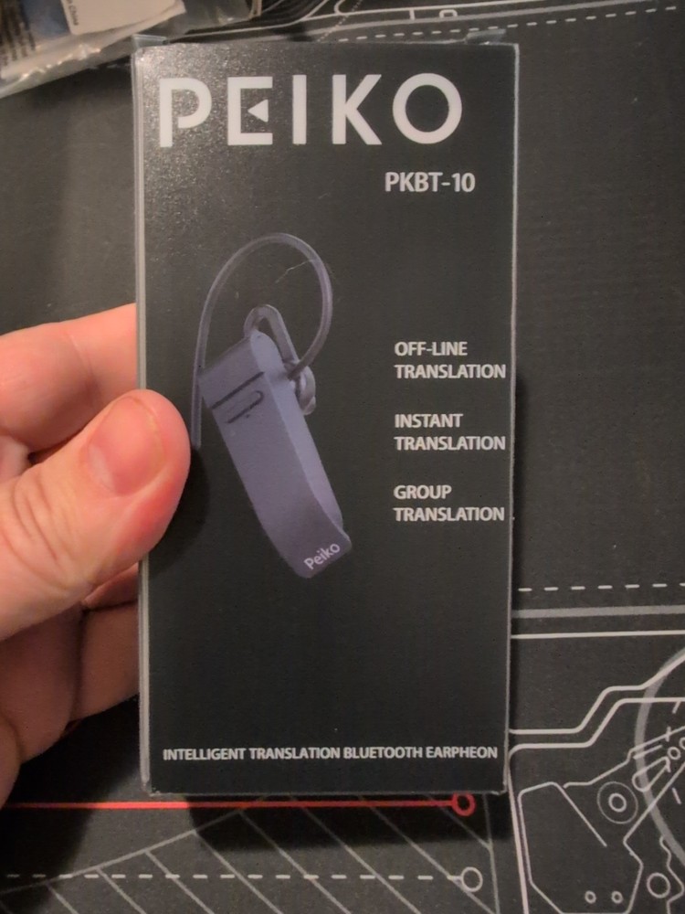 Peiko Language Translator  Bluetooth Ear Piece New