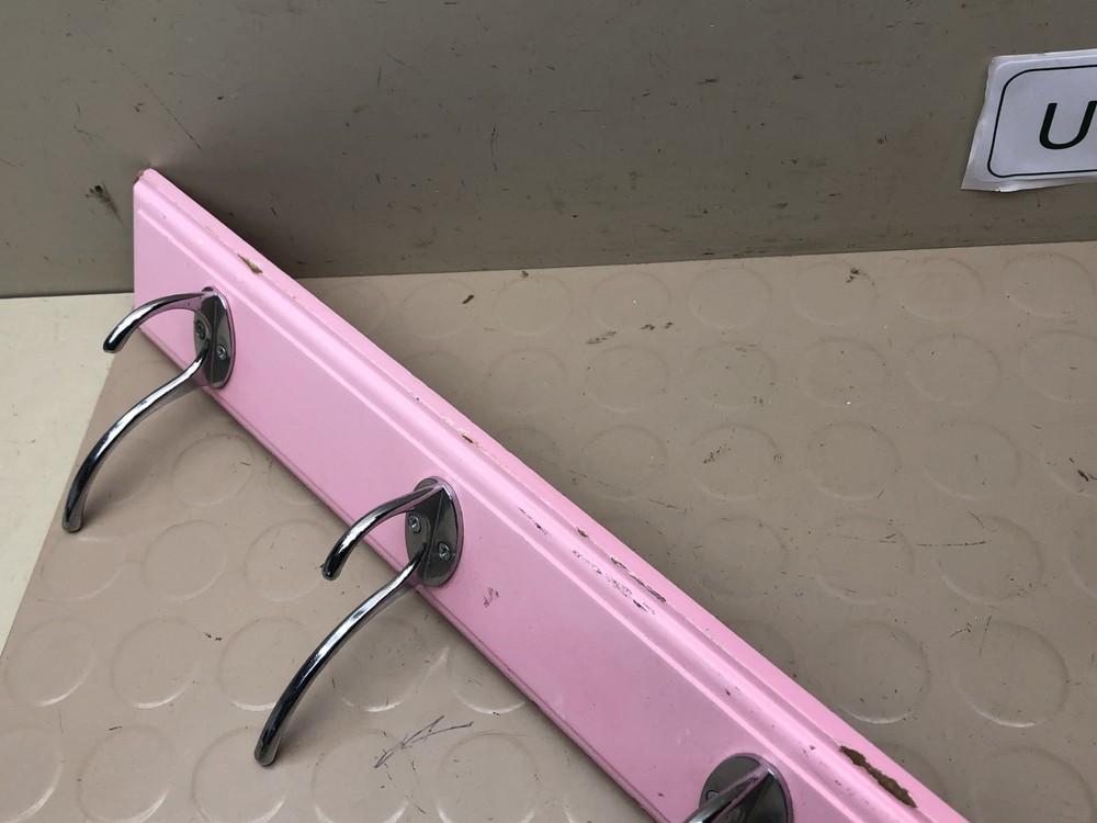 4 Chrome Hooks on Pink Wall Coat Rack