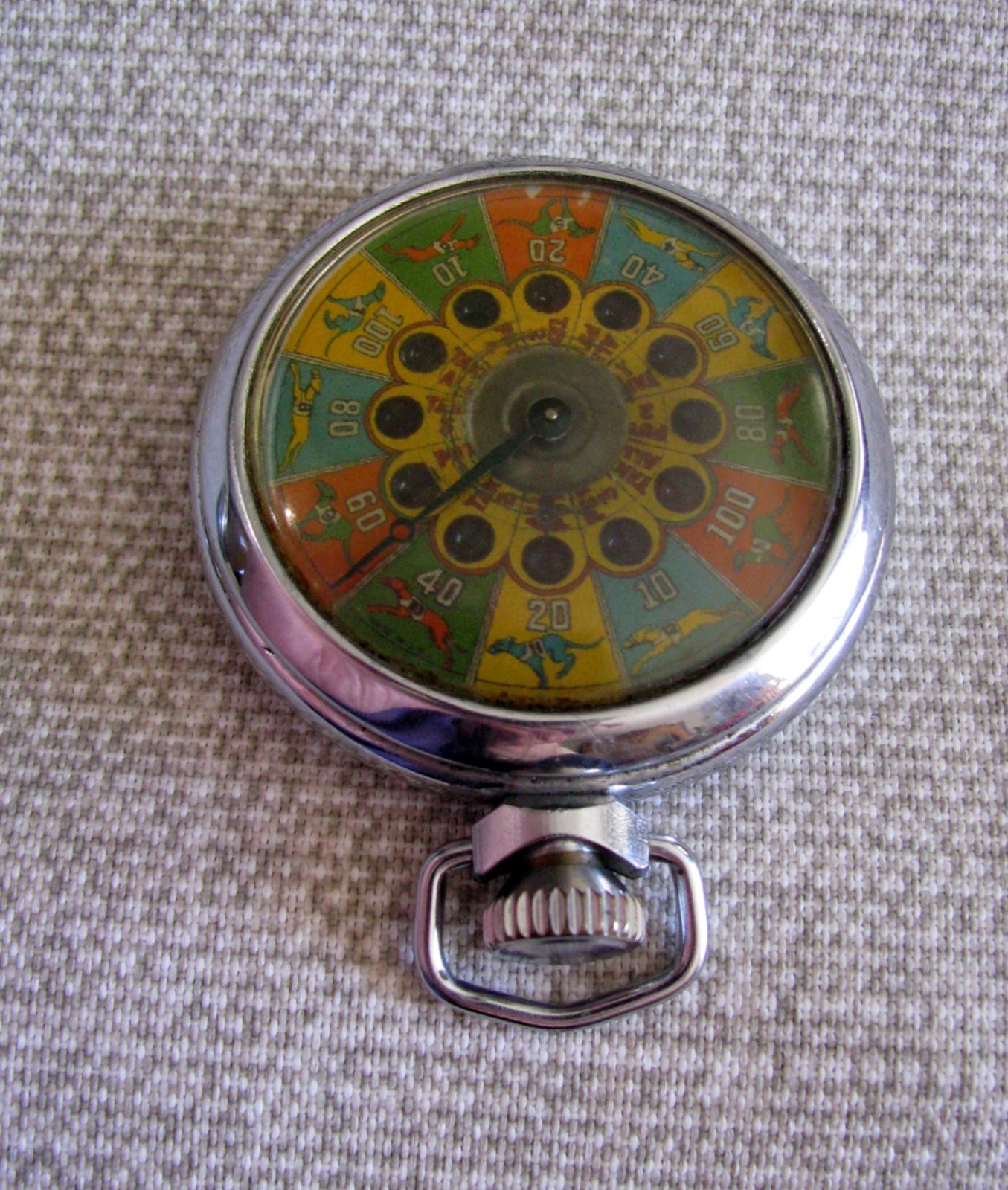 SCARCE PATTERN MECHANICAL GAMBLING DEVICE VINTAGE POCKET SIZE 12 DOGS / PUT+TAKE