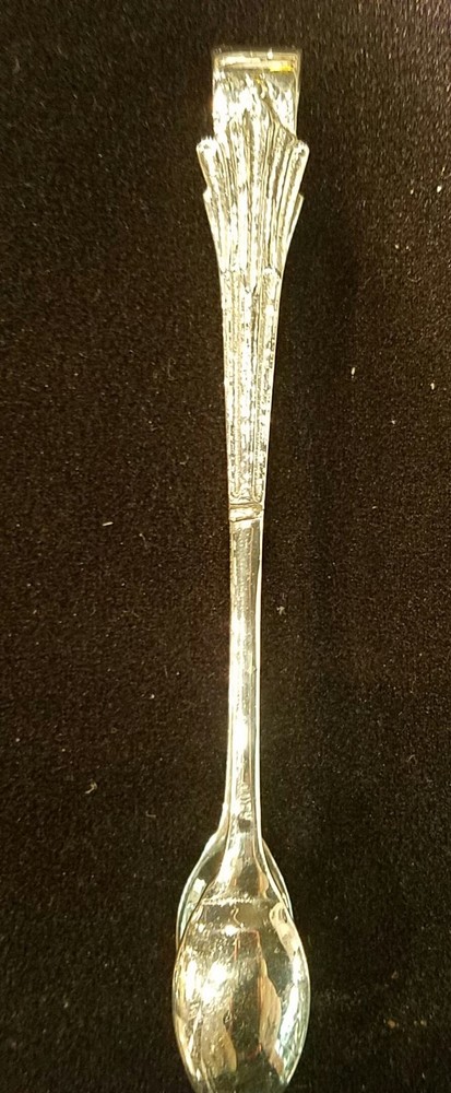 Silver spoon tongs