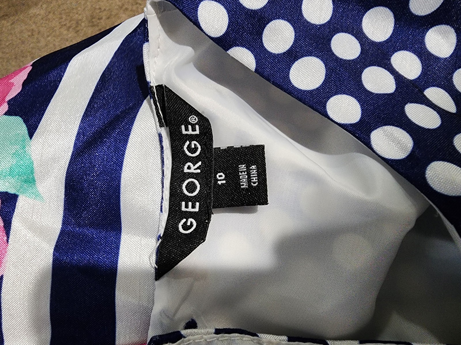 George girls 10 Blue and white striped/polka dot/floral sleeveless dress.