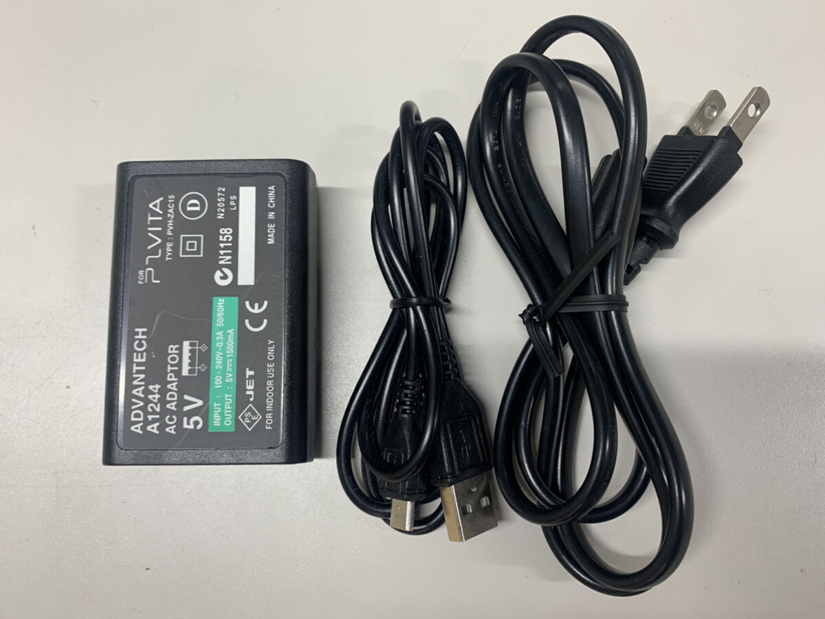 PS Vita PCH-2000 Sony Playstation Console only Choice 3 random games & case Used