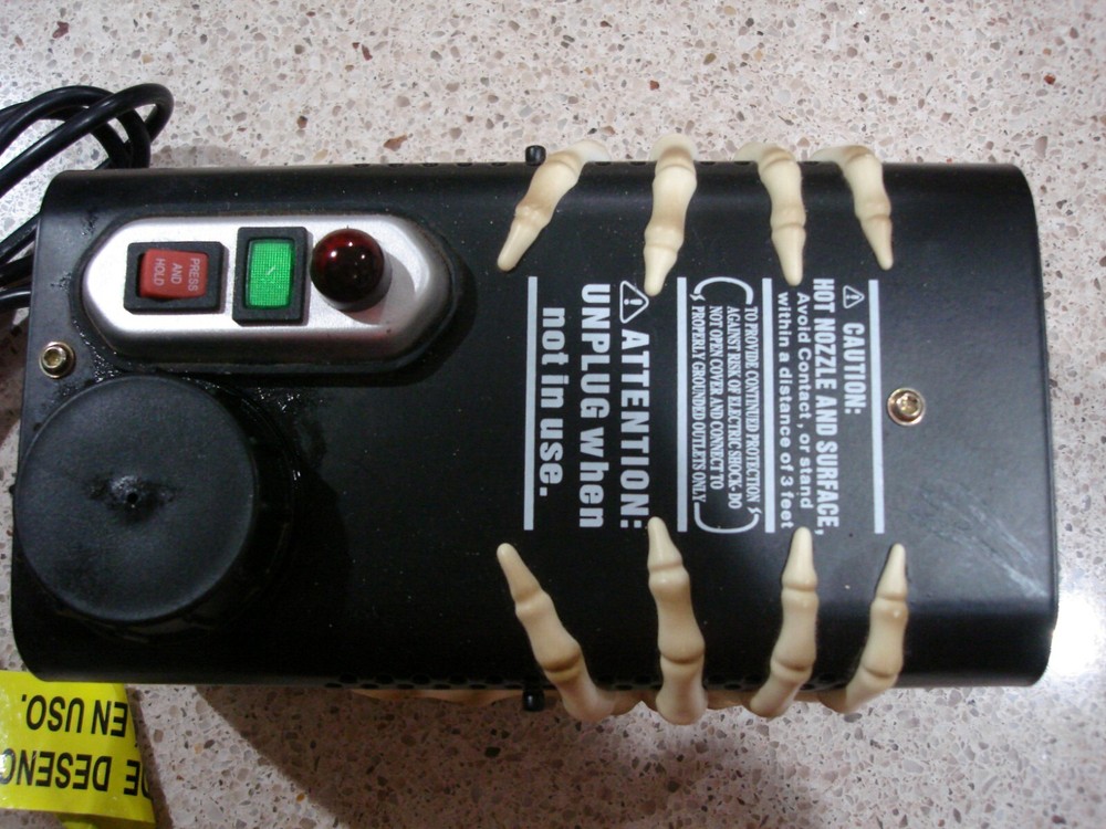 The Fog Machine w/Skeleton Hands EUC