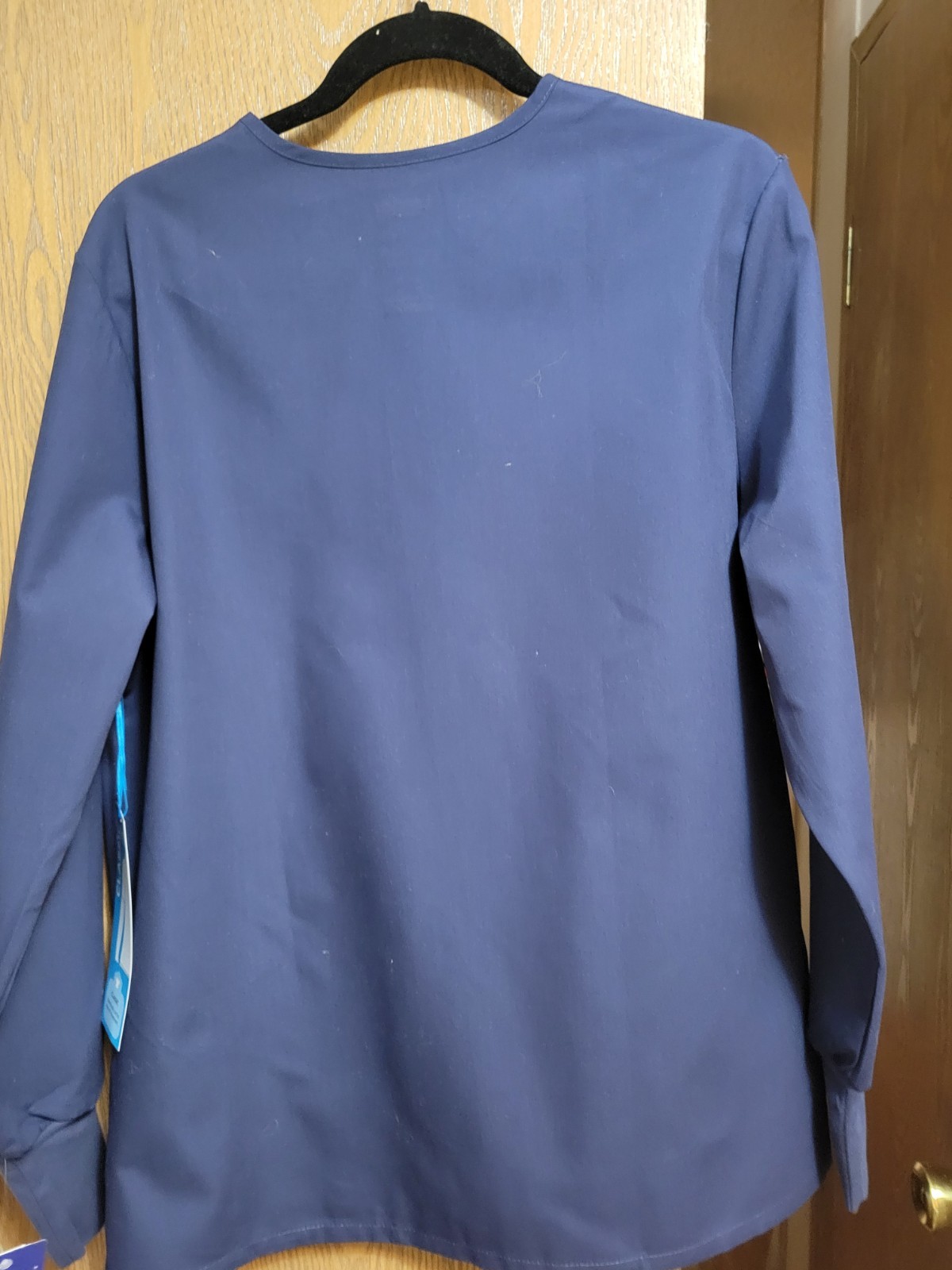 NWT. Med Unisex Long Sleeve Scrub Top/Jacket By Landau. Measurements Posted.