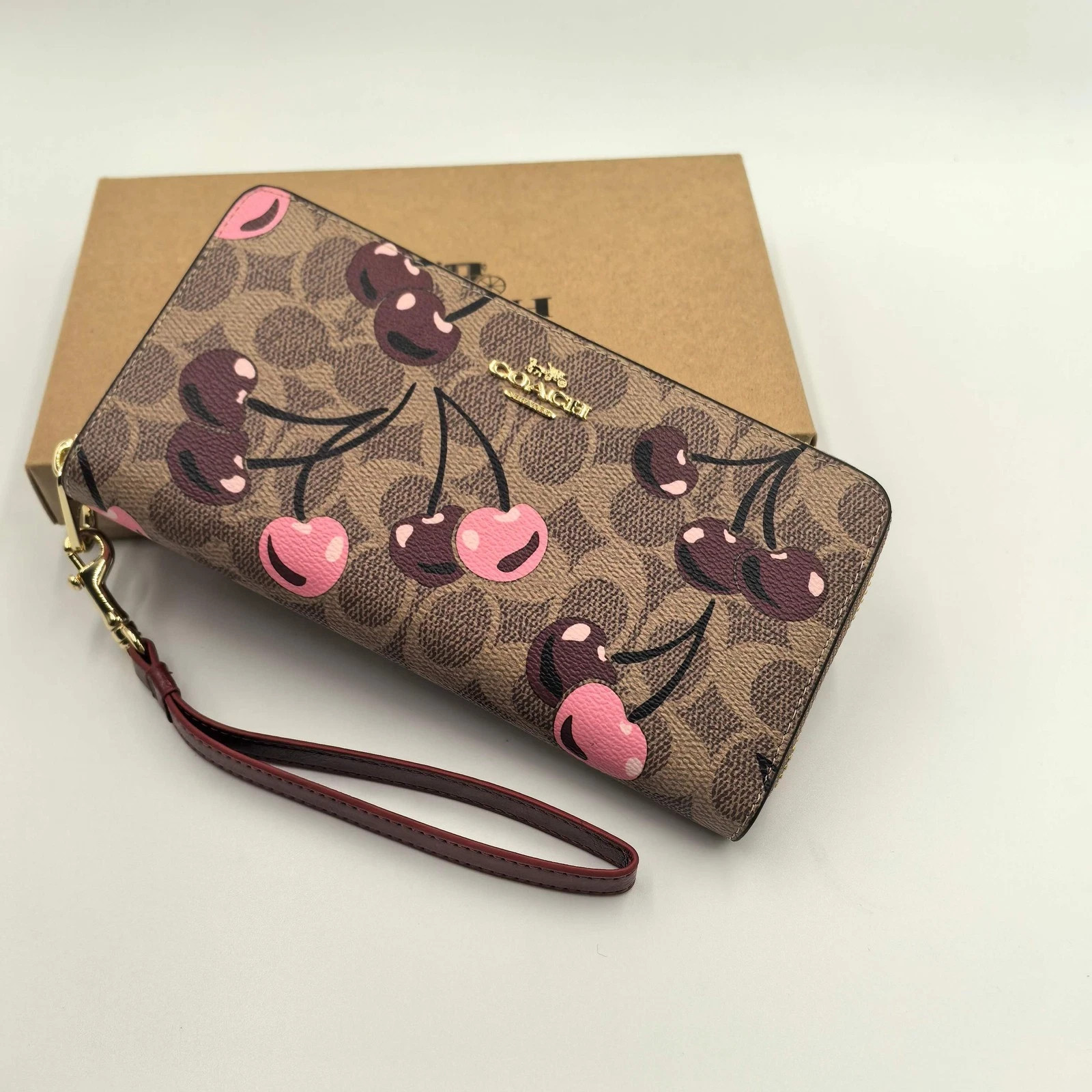 2026 COACH Long Zip Around Wallet In Signature Canvas With Cherry Print CZ328