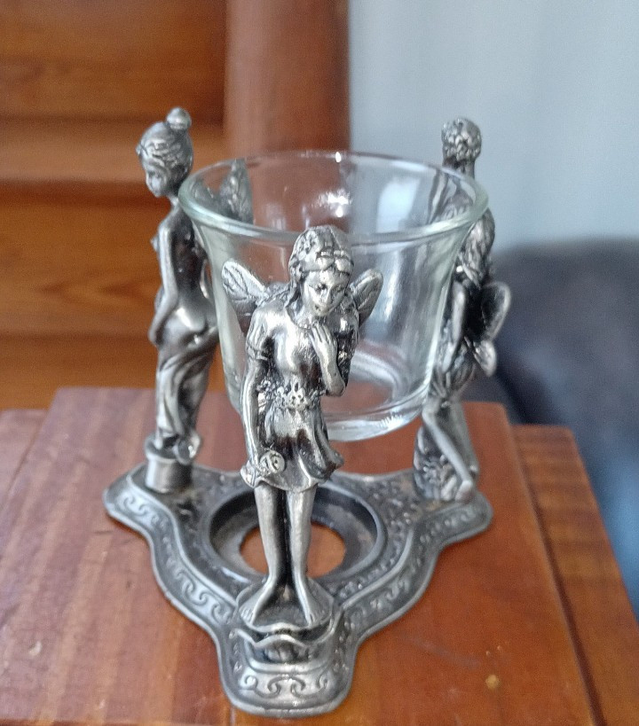 Metal 3 Character Pixie Tealight Holder.