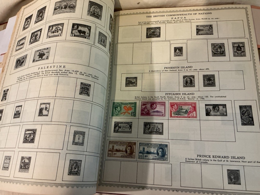 The New World Wide Postage Stamp Album with Over 775 Stamps See Photos