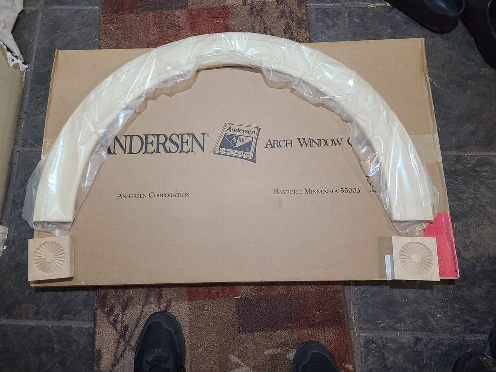 Andersen  244CT28  Arch Window Casing Colonial Maple with Plinth Blocks