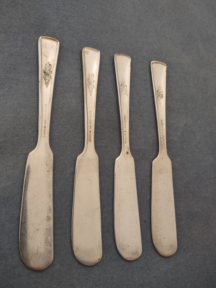 4 Silverplate Butter Spreaders International Silver Camelia pattern