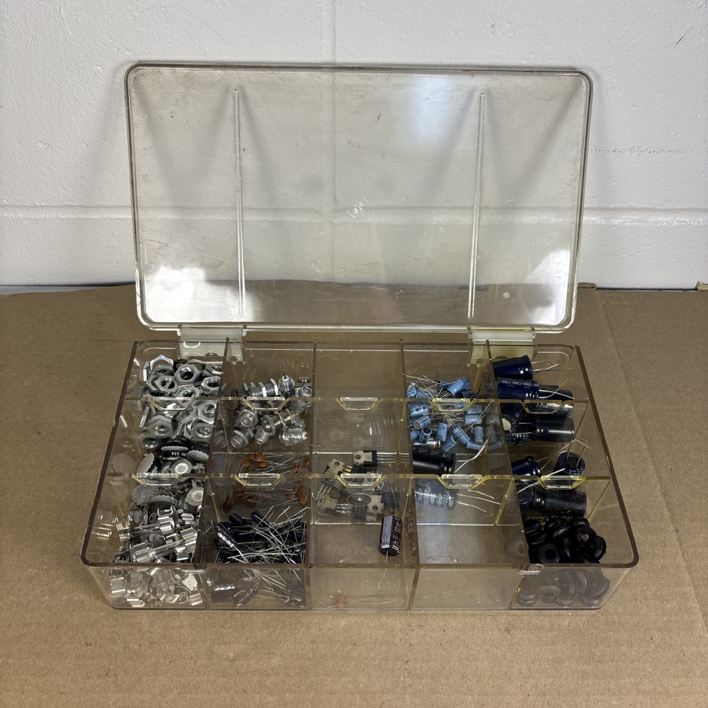 assorted electronics components, parts in a compartment box, NOS capacitors, etc