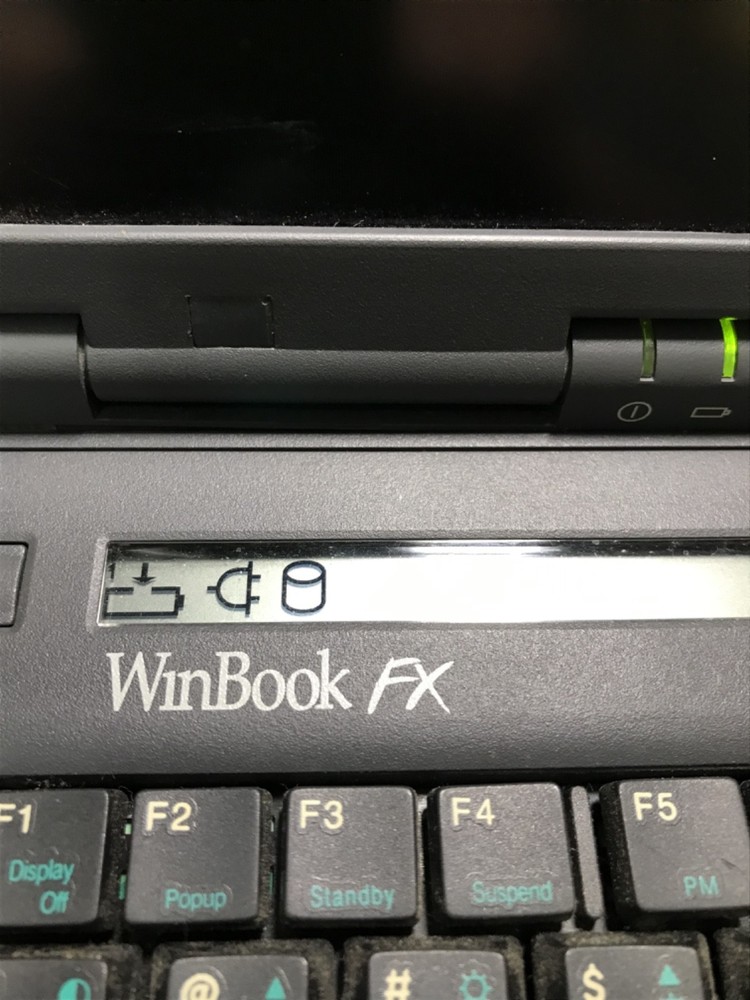 WINBOOK FX /INCLUDES ADAPTER /NEEDS TESTING/COSMETICALLY POOR