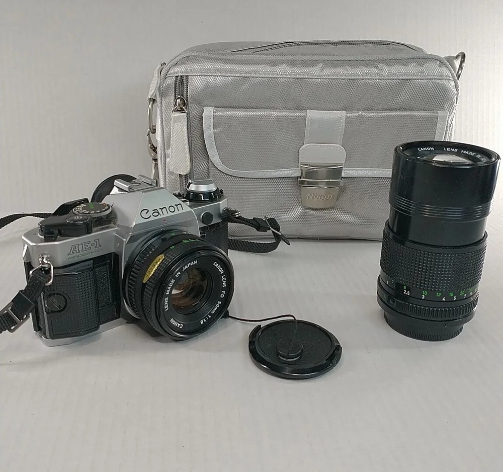 Canon AE-1 Program 35mm Camera Bundle With 50mm / 135 Lens Strap & Camera Bag