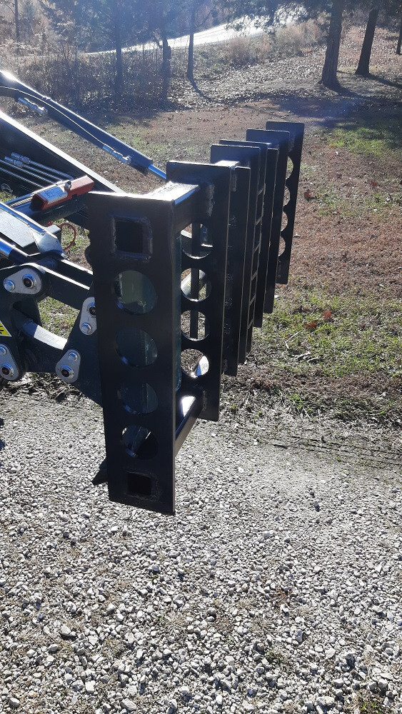 Skid Steer quick attach frame for Xsystem attachments.
