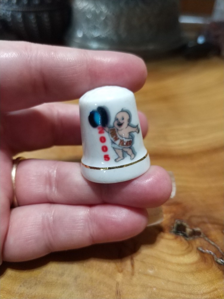 Vintage ceramic thimble. New Year 2000 millennium baby
