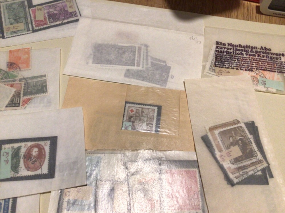 German & DDR mixed stamps in packets A9431