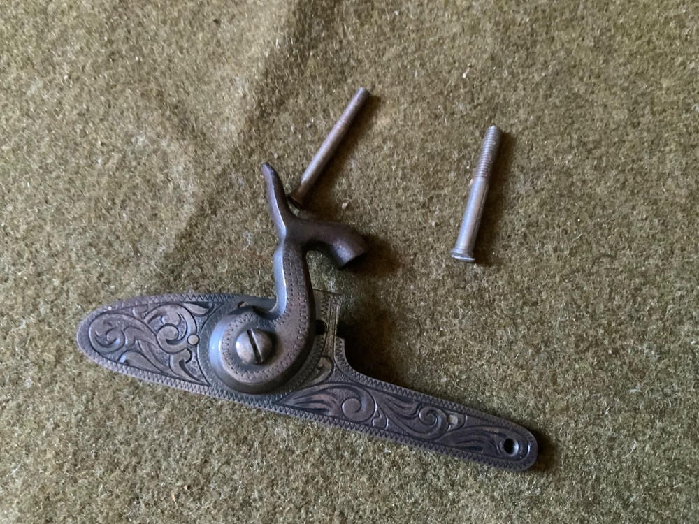 Percussion lock with screws